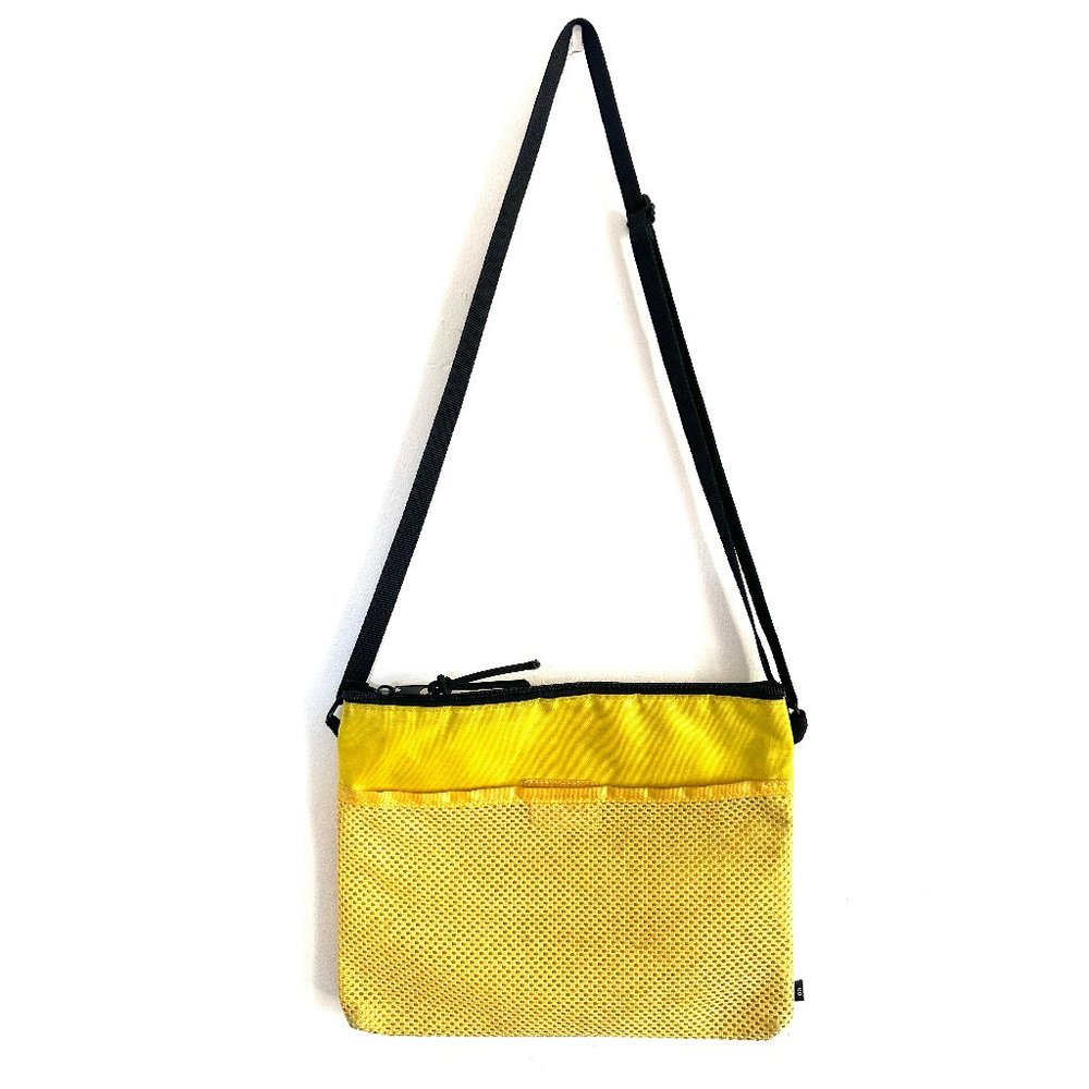 Urban Outfitters Crossbody Bag, side bag is made with 100% Nylon.